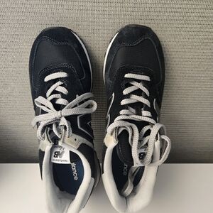 New Balance Black and White Lace-Up Sneakers